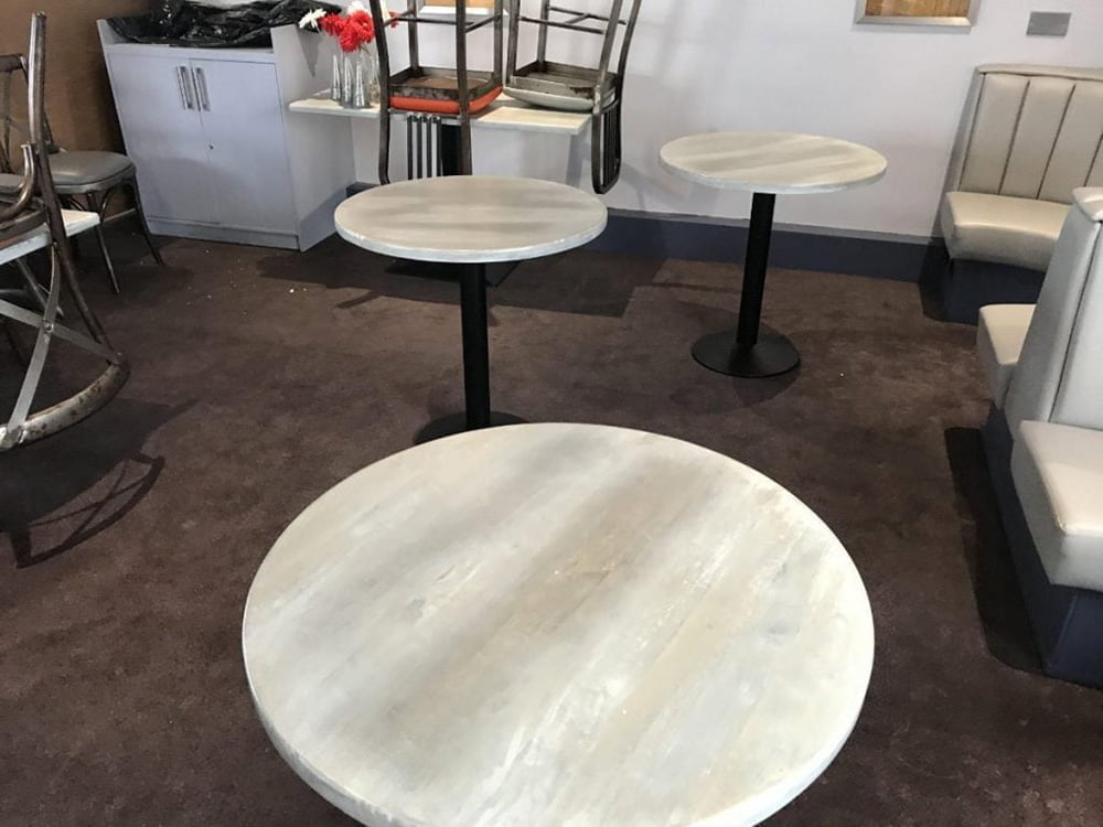 Stacks Bistro tables before adding smart writable surfaces